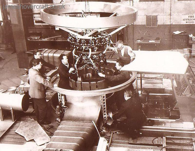 The SRN1 being manufactured - Here is shown a later stage in the SRN1's build, including the cockpit (right), engine, and support for the propeller. Also can be seen one of the two air ducts (lower middle) used to bleed air from the main lift fan to provide thrust in the form of two directional air jets (submitted by Peter Insole).