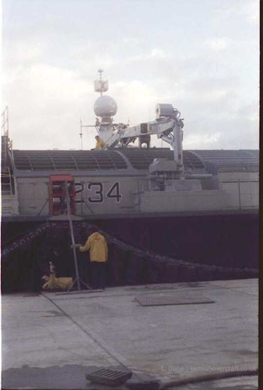 The Vosper-Thornycroft VT-2 undergoing engineering works at the VT base, Portchester 1981 - Undergoing skirt maintenance, also investigations to improve ride height (submitted by Ernie Dunn).