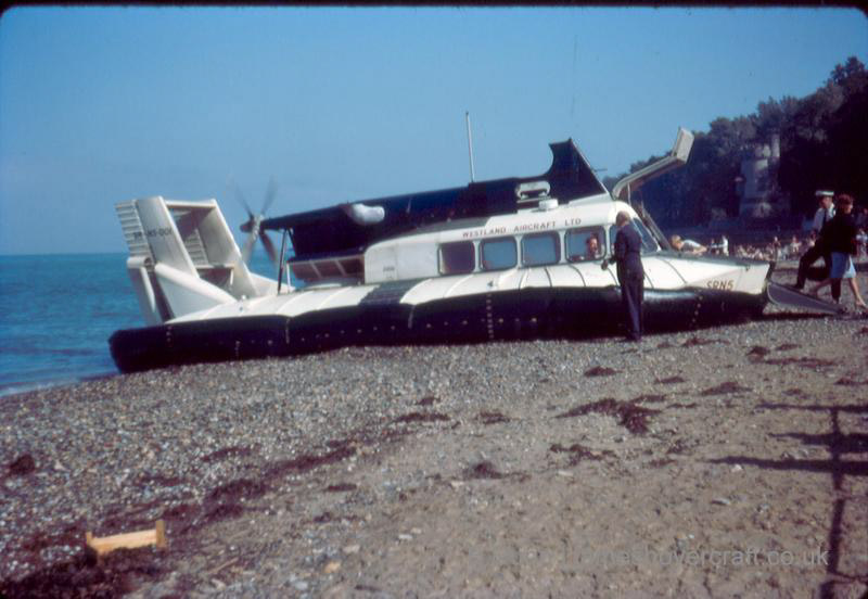 The SRN5 takes Passengers - Waiting on the beach in Westland colours (credit: Ernie Dunn).